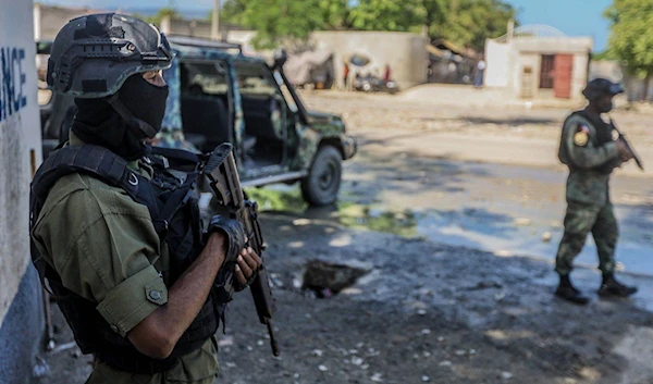 Haitian soldiers guard the public prosecutor's office in Port-au-Prince earlier this month.(AFP)