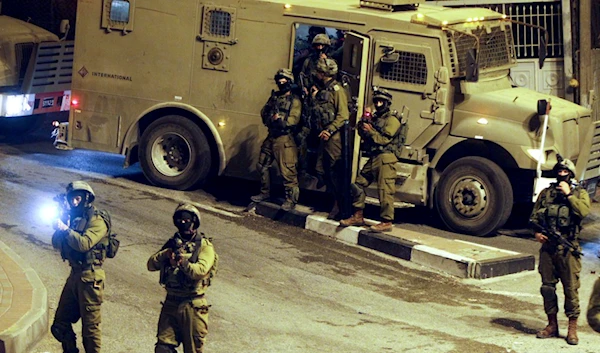 The Israeli occupation forces carrying out an arrest and raids campaign in the West Bank