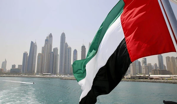 UAE flag flies over a boat at Dubai Marina, May 22, 2015. (REUTERS)