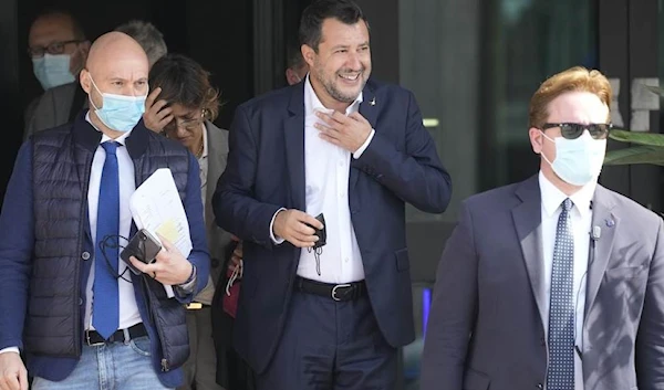 Former minister of interior, Matteo Salvini, center, leaves the Palermo's court in Italy, on October 23, 2021