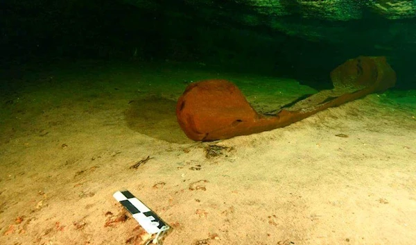 A wooden canoe used by the ancient Maya, Mexico's National Institute of Anthropology and History (INAH)/Handout via REUTERS