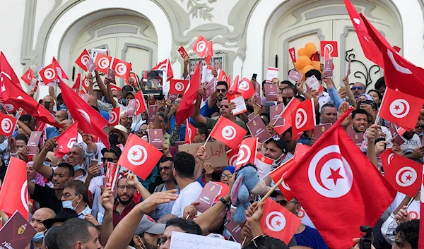 Tunisian protestors gathered on Sunday in the streets leading to Bardo Square.