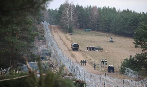 A migrants camp on the Belarusian-Polish border November 18, 2021 (AFP)