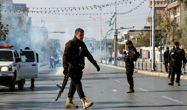 Tear gas canisters were thrown at protesters.