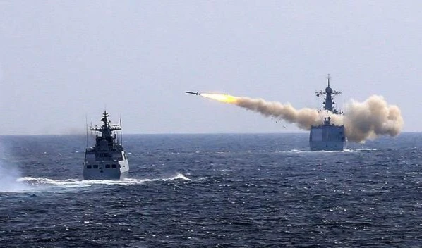 The missile destroyer Jinan of the People's Liberation Army Navy fires an anti-ship missile during a military drill held in the East China Sea, 2016, China Daily's Archive