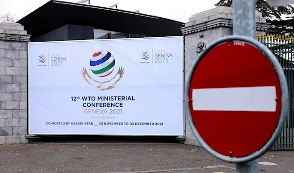 A sign of the meeting posted outside WTO Headquarters in Geneva