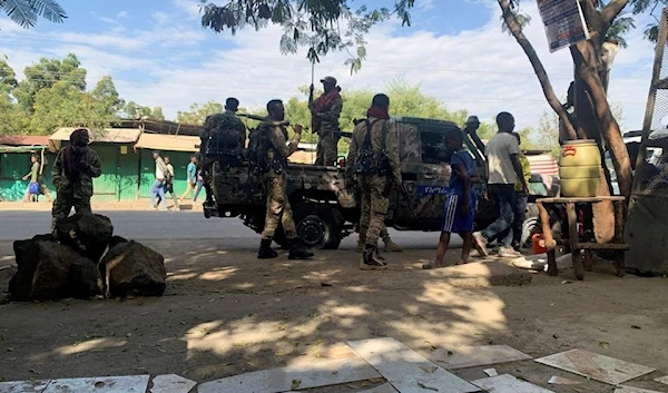 Members of the Ethiopian National Defense Force (ENDF) prepare to head to mission in Sanja, Amhara region, near a border with Tigray, Ethiopia November 9, 2020 (Source: Reuters)