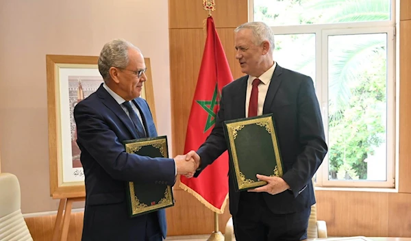 Israeli security minister Benny Gantz with his Moroccan counterpart Abdellatif Loudiyi in Rabat on November 24, 2021