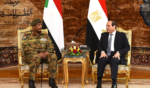 Egyptian President Abdel Fattah el-Sisi, right, meeting Lieutenant General Abdel Fattah al-Burhan, chief of Sudan's ruling military council, on May 26, 2019 | AFP