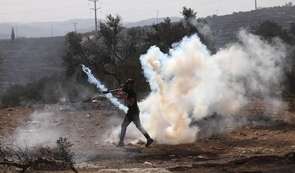 Palestinian youth confront occupation forces in Beita south of Nablus yesterday