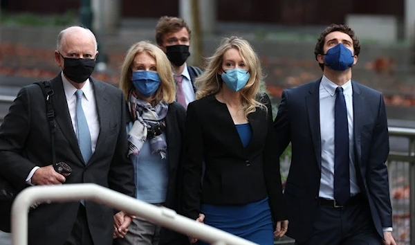 Elizabeth Holmes heads to court with her parents and partner (Getty Images)