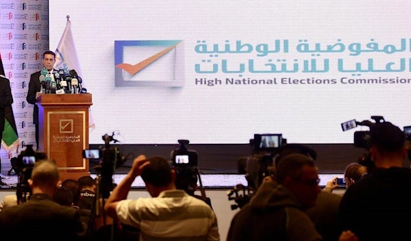 Chairman of Libya’s High National Election Commission Emad al-Sayeh holds a press conference on 23 November 2021 in Tripoli, Libya (Anadolu Agency)