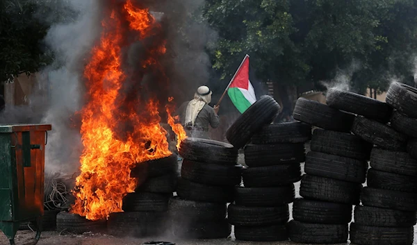 The Israeli occupation forces used a stun grenade against a Palestinian Red Crescent ambulance