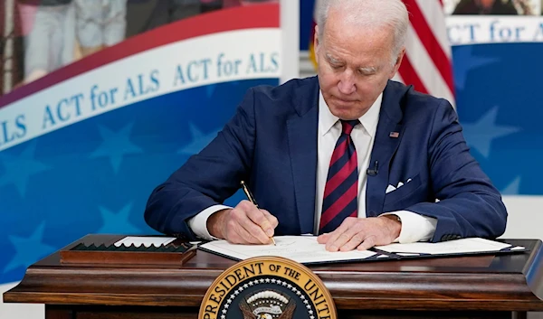 Biden signs law banning imports from Chinese Xinjiang region