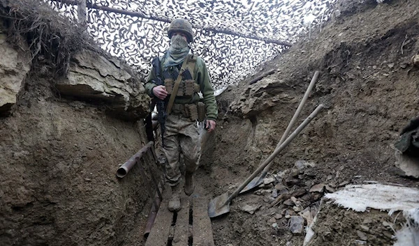 A Ukrainian soldier in the Donetsk region (AP)