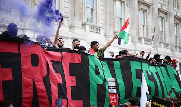 Protest calls to free Palestine.