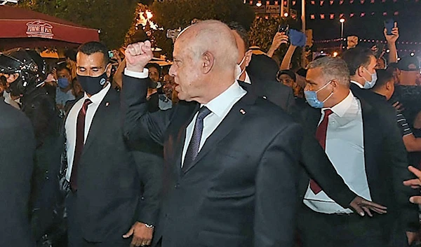 Tunisian President Kais Saied tours Habib Bourguiba Street amid intense security and military reinforcements on July 25, 2021 (AFP)