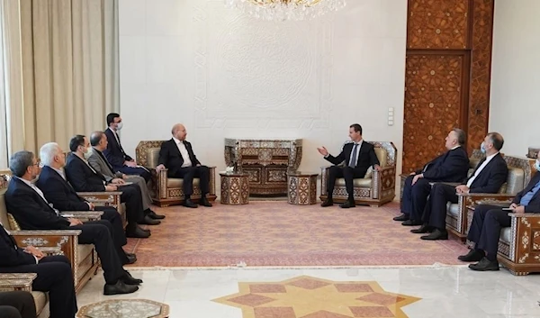 President al-Assad meeting with the president of the Iranian Islamic Consultative Assembly (SANA).