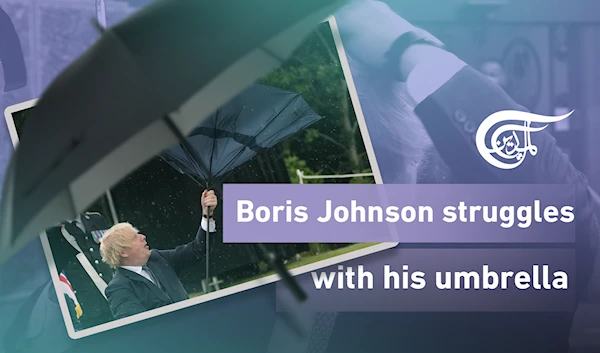 Boris Johnson Struggles With His Umbrella