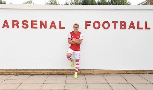 Odegaard wearing the Arsenal shirt.