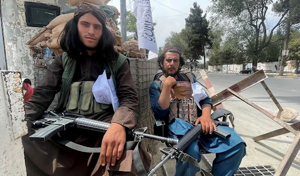 Taliban fighters at a Kabul checkpoint (Reuters)