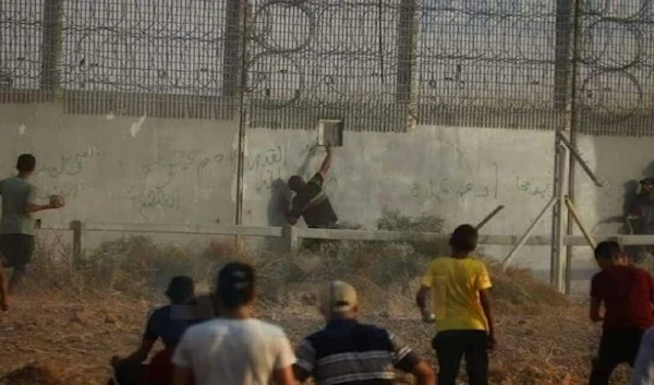 The moment the Palestinian shot the Israeli soldier through a hole in the wall