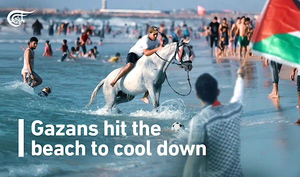 Gazans hit the beach to cool down as the temperature rises.