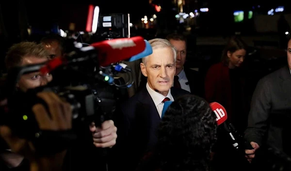 Labor leader Jonas Gahr Store makes his way to the Labor Party's election event in Folkets Hus in Oslo on September 13, 2021 | AFP