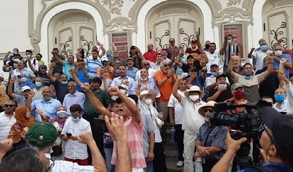 A protest outside the ornate belle epoque theatre on Habib Bourguiba Avenue