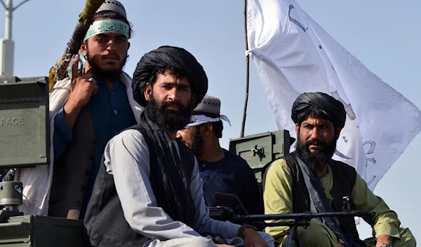 Taliban fighters parading their weapons in Kabul