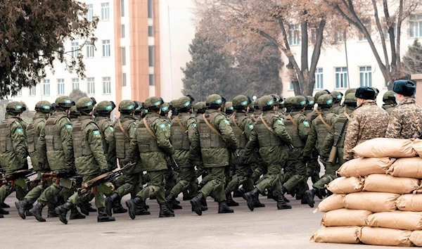 CSTO peacekeeping forces soldiers attend a ceremony marking the end of the CSTO mission in Almaty, Kazakhstan, January 13, 2022 (AFP)