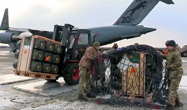 Unloading a RAF C-17 Loaded with NLAW Anti-Tank Missiles to Ukraine