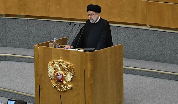 Iranian President Ebrahim Raisi giving a speech at the Russian State Duma