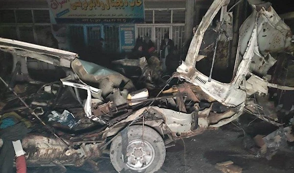 The aftermath of the explosion in Herat, Afghanistan, showing the wreckage of the minivan January 22, 2022