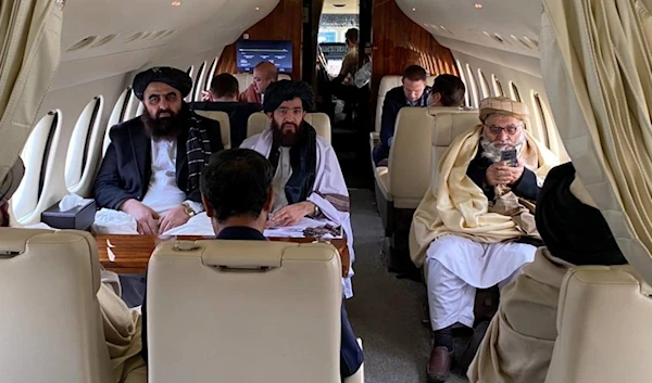 The Taliban delegation on board a plane chartered by the Norwegian government on January 22, 2022