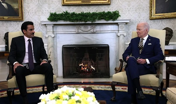 US President Joe Biden holds a bilateral meeting with Qatar’s Emir Sheikh Tamim bin Hamad Al-Thani in the Oval Office at the White House in Washington, US, Jan. 31, 2022. (Reuters)