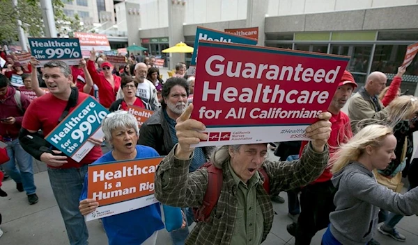 Supporters of single-payer health care march to the Capitol, Wednesday, April 26, 2017(AP)