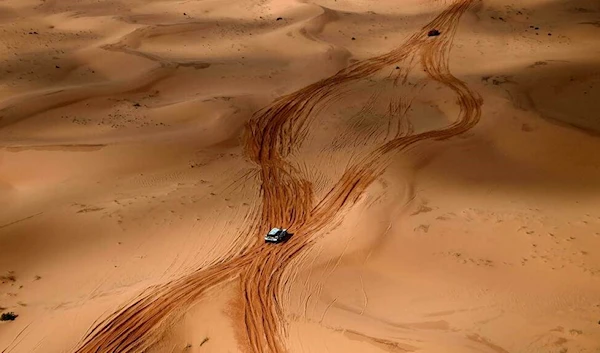 Competitors ride during Stage 3 of the Dakar Rally 2022 between the Saudi areas of al-Artawiya and al-Qaysumah, on January 4, 2022 (AFP)