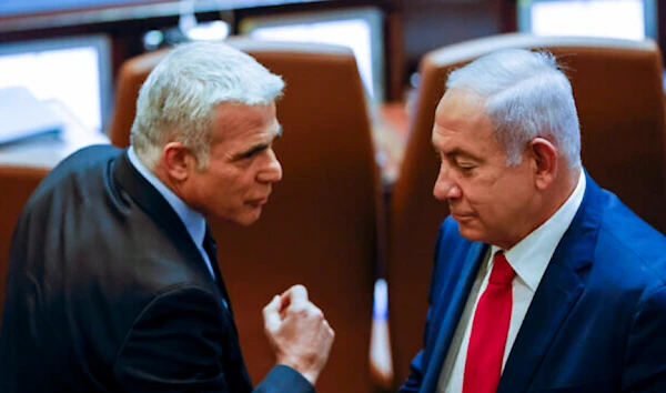 Israeli Prime Minister Yair Lapid and Former Prime Minister Benjamin Netanyahou at the Knesset (Floash90)