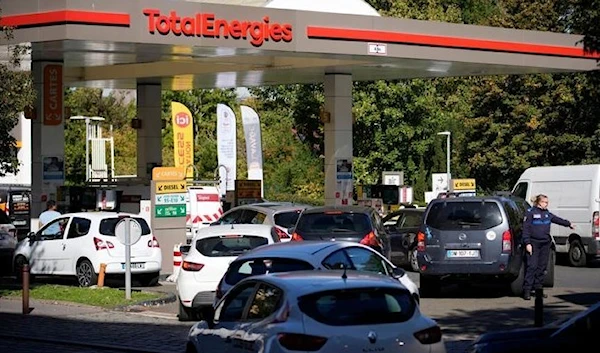 Cars line up in a gas station in Paris. Source: Christophe Ena/ AP October 11, 2022.