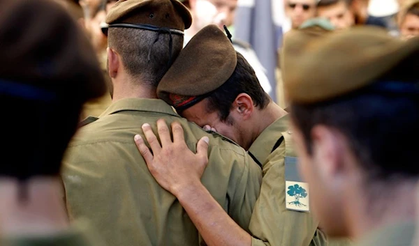 Israeli occupation soldiers mourning a killed soldier