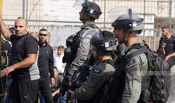 Palestinians confronting occupation attacks in besieged Shuafat camp