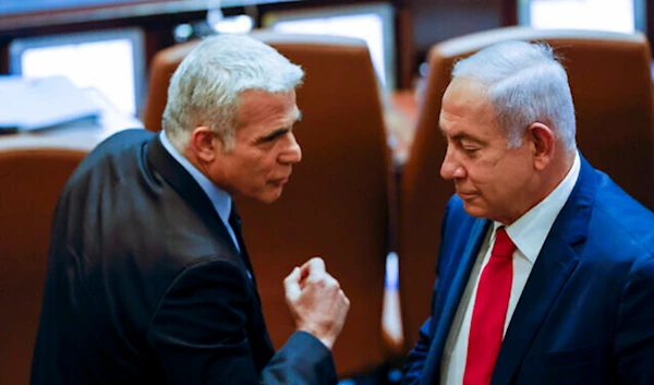 Israeli occupation Prime Minister Yair Lapid and former Prime Minister Benjamin Netanyahu