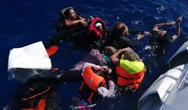 The Turkish Coast Guard rescues migrants illegally pushed back into Turkish territorial waters by Greek forces. (Anadolu Agency)