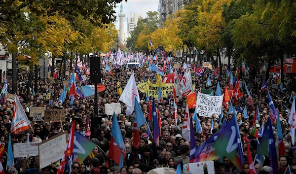 Protestors in the streets of Paris (AFP)