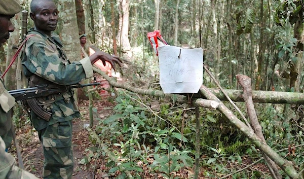 FARDC soldiers next to a booby trap set by the ADF, April 17, 2014