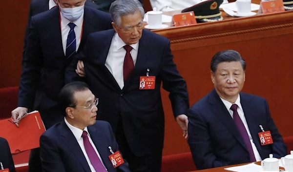 Chinese President Xi Jinping and former Chinese President Hu Jintao