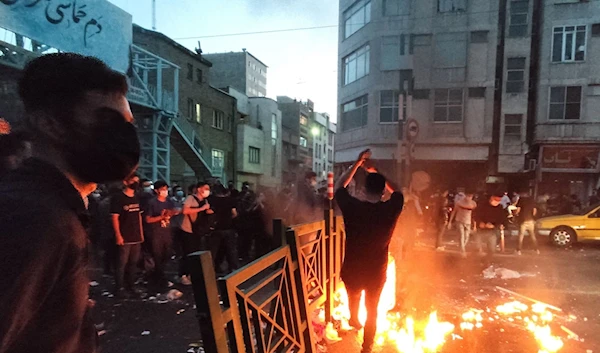 Rioters on the streets of Tehran in September (AFP)