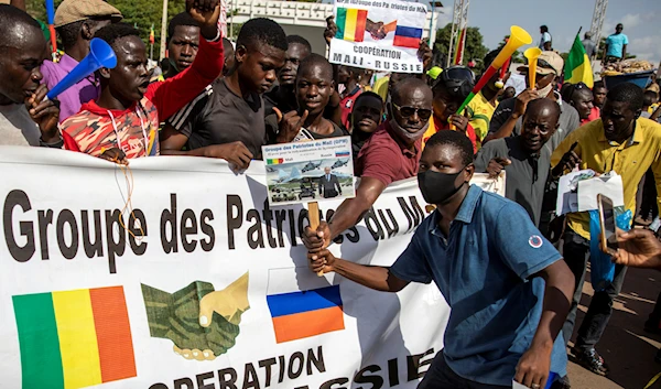 Malians demonstrate against France and in support of Russia on the 60th anniversary of the independence of the Republic of Mali in 1960, in Bamako, Mali Tuesday, Sept. 22, 2020 (AP Photo)