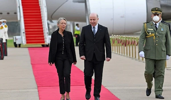 Borne's two-day trip along with 16 ministers -- over a third of her government -- comes just six weeks after President Emmanuel Macron concluded a three-day visit that sought to end months of tensions with Algiers. Photo: Alain JOCARD / AFP Source: AFP